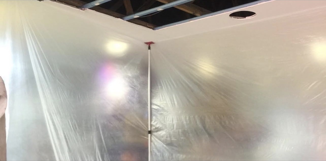 Temporary dust containment barriers around ceiling work
